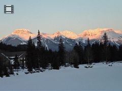 Banff Time Lapse Winter Moonset and Sunrise on  Mount Bourgeau, Mount Brett, Massive Mountain and Pilot Mountain From Bow River bridge